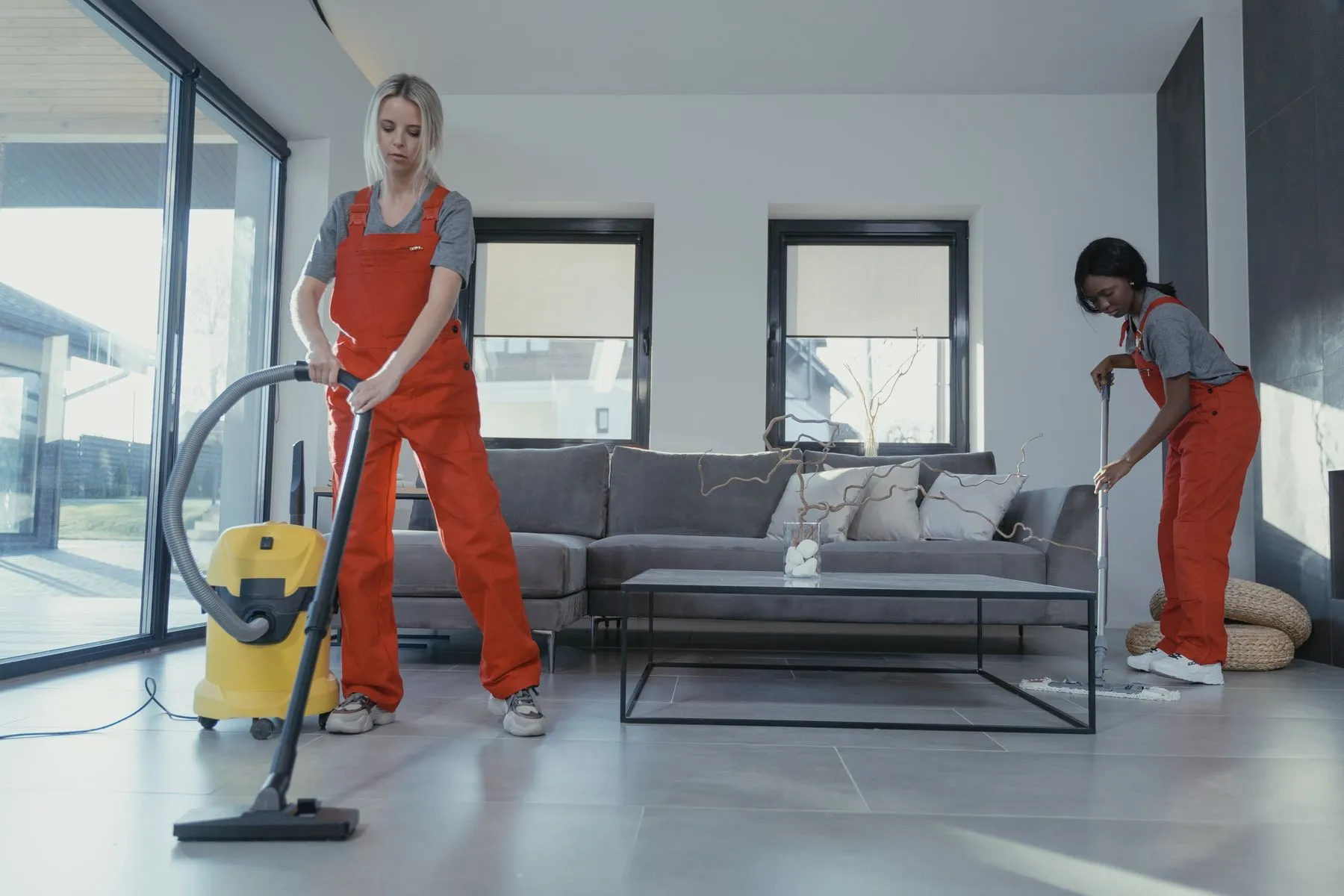 Professional cleaner attending to a high-use shared area